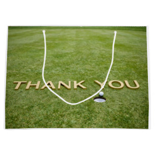 Golf ball with text Thank you on green grass Large Gift Bag