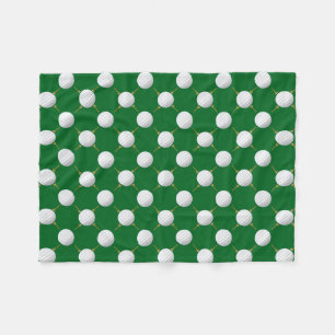 Golf balls and Tees on Green Fleece Blanket