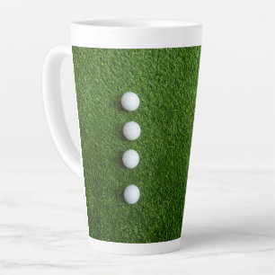 Golf Balls are on green grass Latte Mug
