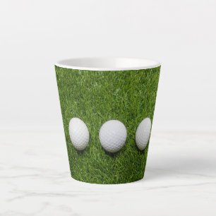 Golf Balls are on green grass Latte Mug