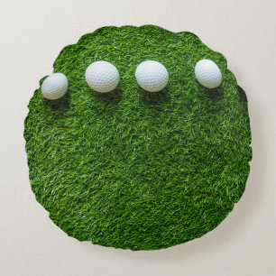Golf Balls are on green grass Round Cushion