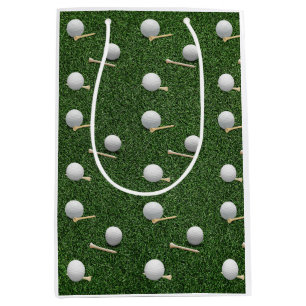 Golf balls on green grass medium gift bag