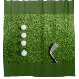 Golf balls on green grass shower curtain
