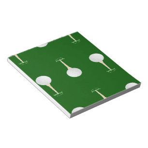 Golf balls pattern on green notepad