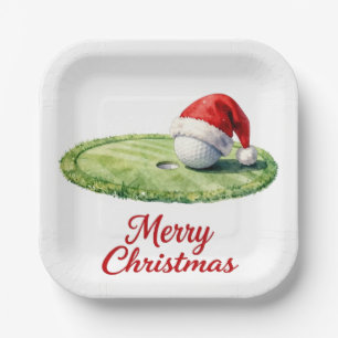 Golf Christmas ball with Santa Hat on Green Paper Plate