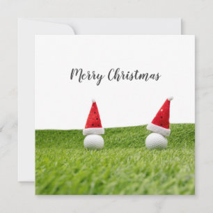 Golf Christmas card with Santa hat on green