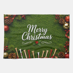 Golf Christmas themed on green grass Tea Towel