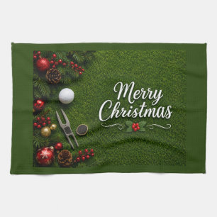 Golf Christmas themed on green grass Tea Towel