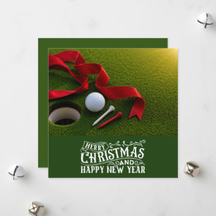 Golf Christmas themed with golf ball on green Holiday Card