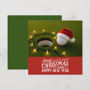 Golf Christmas themed with golf ball on green Holiday Card