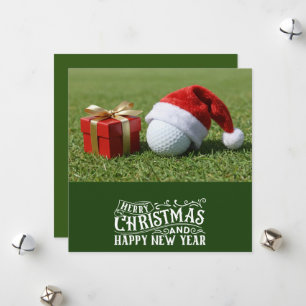 Golf Christmas themed with golf ball on green Holiday Card