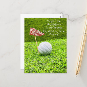 Golf Christmas with golf ball on green grass Holiday Postcard