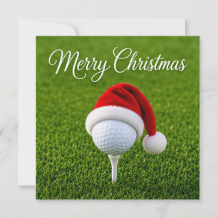 Golf Christmas with Santa hat on green grass  Card