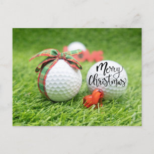 Golf Merry Christmas with ball on green grass Postcard