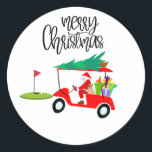Golf Merry Christmas with Santa Claus at flag  Classic Round Sticker<br><div class="desc">For a fun and festive way to show your holiday spirit on the green, consider this Golf Merry Christmas with Santa Claus at flag Classic Round Sticker. It's a great way to add some holiday cheer to your game, and it also makes a great gift for the golfer in your...</div>