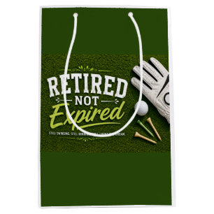 Golf Retirement themed with golf ball on green Medium Gift Bag
