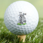 Golfer Classic Initial Monogram Golf Balls<br><div class="desc">This gender-neutral monogram golf ball features a stylish grey watercolor golf bag filled with clubs, surrounded by a touch of green grass. The design cleverly incorporates a simple serif font initial monogram on the bag, seamlessly blending into the bag's design. The monogram is currently in a dark grey, almost black,...</div>