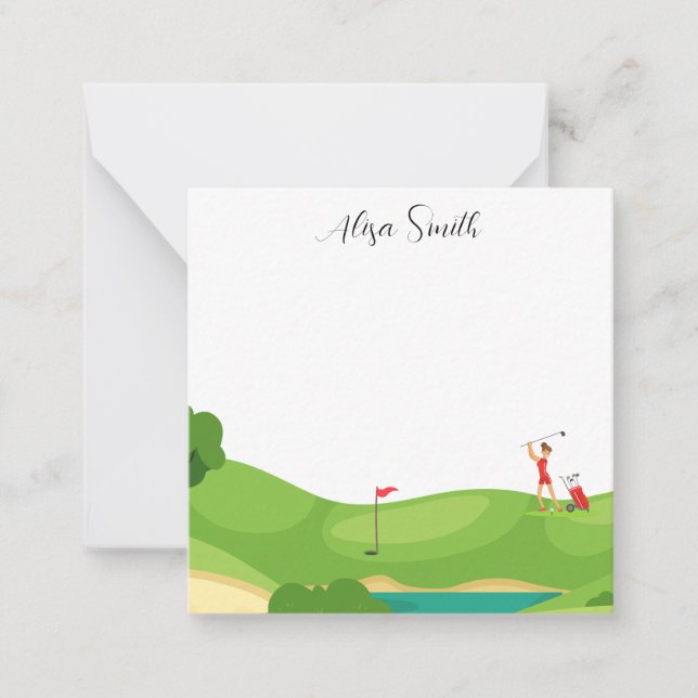 Golfer Woman is on green grass in golf course Card (Front)