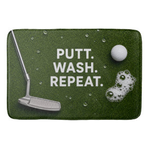 Golfer's bathroom with golf balls and putter bath mat