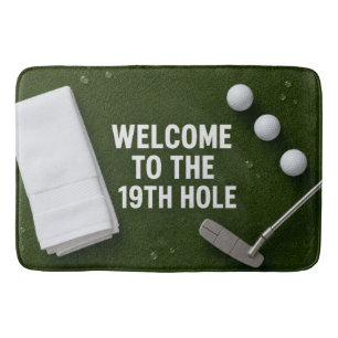 Golfer's bathroom with golf balls and putter bath mat