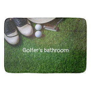 Golfer's bathroom with golf balls on green grass b bath mat