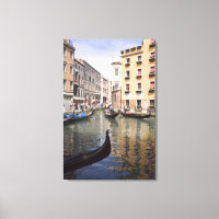 Gondolas in a canal, Venice, Italy
