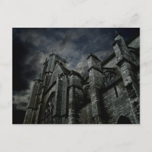 Gothic cathedral with a gloomy dark sky postcard