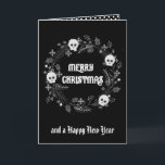 Gothic Christmas Wreath Holiday Card<br><div class="desc">This Gothic Christmas Wreath With Skulls card features a lovely Christmas wreath decorated with playful skulls against a black background. Customise with your greeting on the front and add a special message inside.</div>