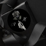 Gothic Halloween Black Wedding Skeleton Hand Rose  Classic Round Sticker<br><div class="desc">Nothing screams "I do!" like a Halloween-inspired gothic wedding. Get ready for a bone-chillingly beautiful celebration like no other with our 'Til Death Do Us Part skeleton & floral Halloween gothic theme wedding sticker. Our beautiful wedding sticker features our own hand-painted watercolor skeleton hand-holding a black rose with a custom...</div>