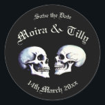 Gothic Purple Dancing Skeletons Save the Date Classic Round Sticker<br><div class="desc">Black Death Gothic Purple Dancing Skeletons Spooky Save the Date Stickers | Personalised Wedding Envelope Seals. Step into an eerie ambiance with our Black Death Gothic Dancing Skeletons Stickers. Customise these stickers with your name or a special message to infuse a personal touch. If you seek further customisation, don't hesitate...</div>