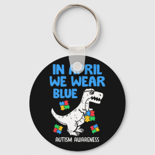 Grab this funny In April We Wear Blue Dinosaur Hol Key Ring