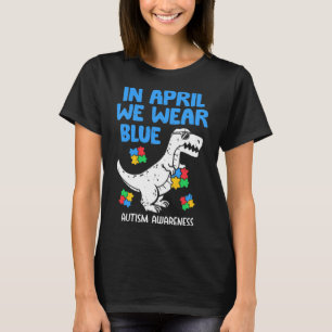 Grab this funny In April We Wear Blue Dinosaur Hol T-Shirt