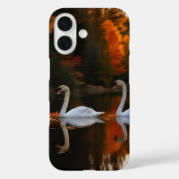 Graceful White Swans Gliding Across Autumn Pond