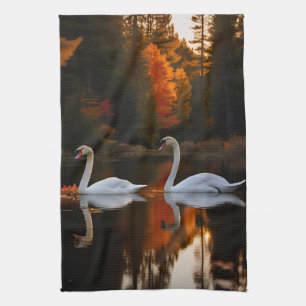 Graceful White Swans Gliding Across Autumn Pond Tea Towel