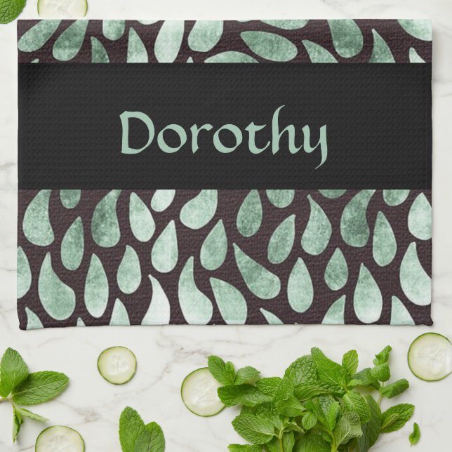 Gradient green petals on black tea towel (Folded)