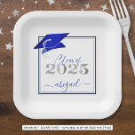 Graduation 2025 Faux Metallic Royal Blue Silver Paper Plate<br><div class="desc">Modern personalised CLASS OF 2025 royal blue, silver and white graduation party plates with your graduate's name in a chic handwritten script with faux metallic royal blue graduation cap and faux metallic silver 2025. ASSISTANCE: For help with design modification/personalisation, colour change, transferring the design to another product or would like...</div>