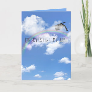 Graduation cap in clouds with rainbow card