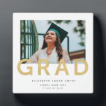 Graduation Photo Modern Gold Personalised Keepsake Plaque<br><div class="desc">Commemorate your graduate's accomplishments with this modern keepsake photo plaque featuring the word grad in large, gold letters on a white background. Wonderful for high school, college and beyond. Part of a collection from Parcel Studios. Note: This gold in this product is simulated. Gold foil will not be used in...</div>