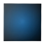 Grainy Blue-Black Vignette Tile<br><div class="desc">This design features a simple background of deep blue in the centre, fading darker and darker towards the outside edge where it is black. The design has a grainy texture for a softer, natural feel. This blue to black grainy vignette is beautiful as it is, or it can be the...</div>