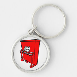 grand red upright piano with music.png key ring