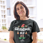 Grandma elf family matching christmas outfit name T-Shirt<br><div class="desc">Get into the holiday spirit with this fun Grandma elf t-shirt which is part of a matching family elf outfit collection containing gifts for any member of the family. Perfect for any Christmas family reunion, this t-shirt features a cute elf hat and fun legs, with the caption "Grandma elf" in...</div>