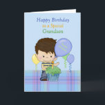 Grandson Special Happy Birthday Boy with Cupcake Card<br><div class="desc">A sweet card for a Special Grandson, featuring a blue background with lower blue plaid and a sweet little boy wearing a blue and yellow shirt and jeans. There is a green cupcake in front of the little boy and balloons floating around. Boy and cupcake original design by Cheryl Seslar...</div>