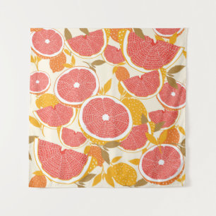 Grapefruit and halved slices with leaves on white. tapestry