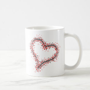 Graphic heart shape composed of many hearts coffee mug