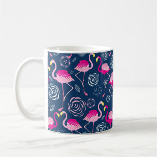 Graphic pattern of pink flamingos on a dark blue b coffee mug