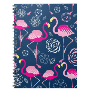 Graphic pattern of pink flamingos on a dark blue b notebook