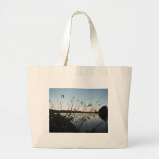 Grasses at lake Sunset Large Tote Bag