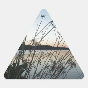 Grasses at lake Sunset Triangle Sticker