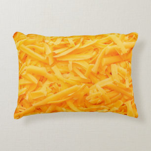grated cheddar cheese top view decorative cushion