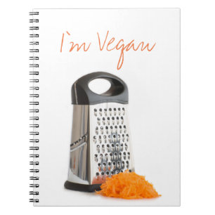 Grater and grated carrot notebook